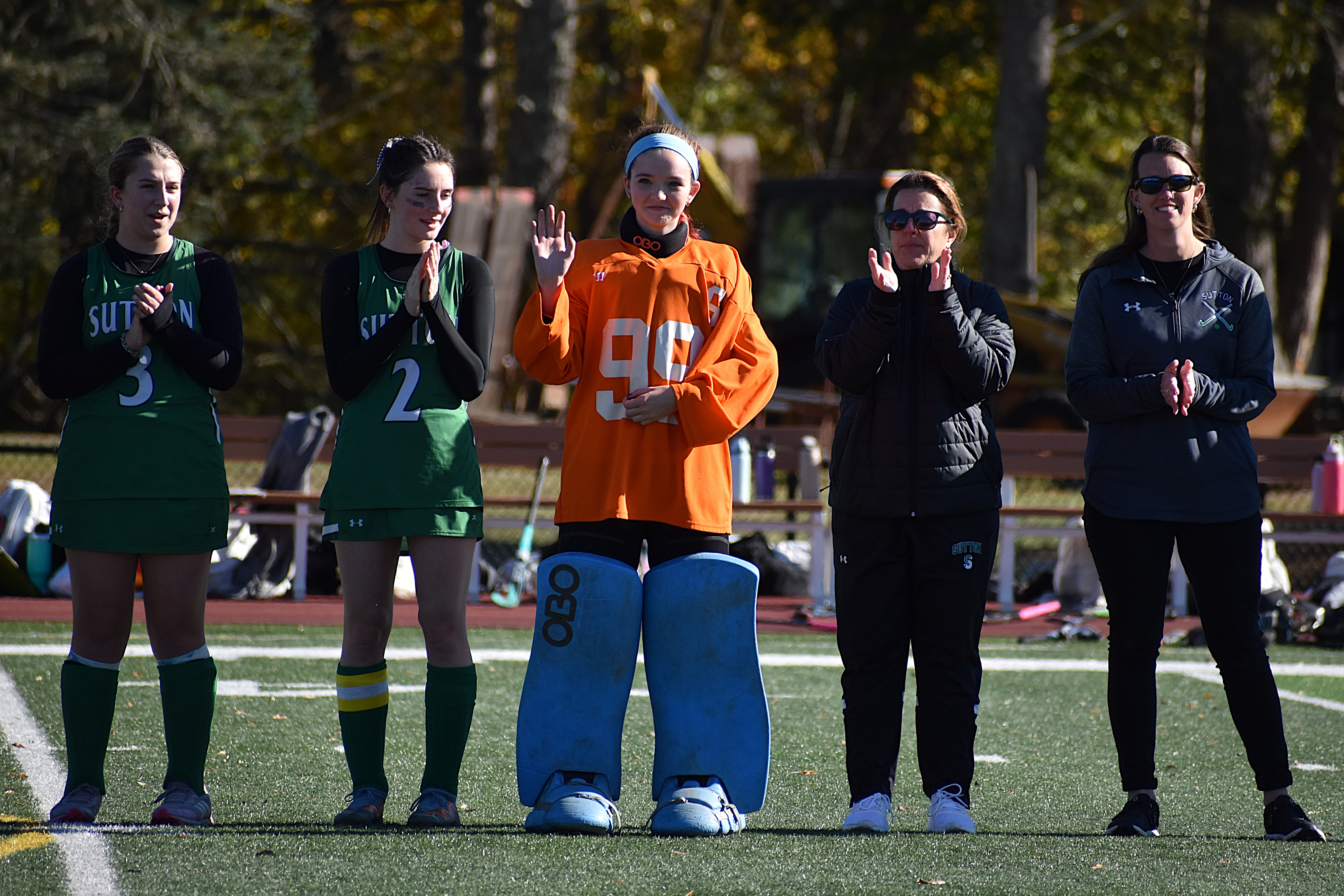 Peyton Lee Winchell with team and coaches